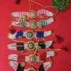 Traditional Indian jewelry set with necklace, earrings, and pendant for women and girls.