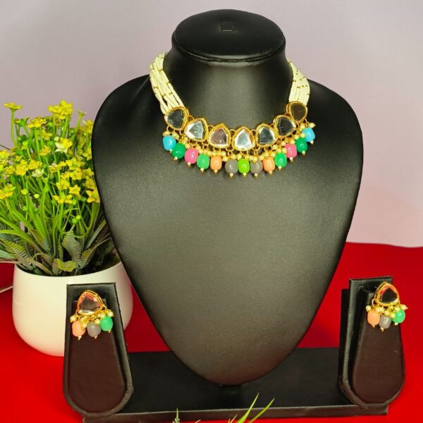 Vibrant multi-color necklace set with matching earrings for traditional and festive wear.