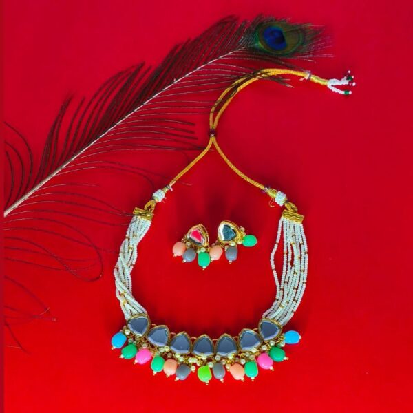 Vibrant multi-color necklace set with matching earrings for traditional and festive wear.