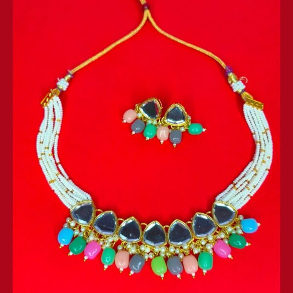 Vibrant multi-color necklace set with matching earrings for traditional and festive wear.